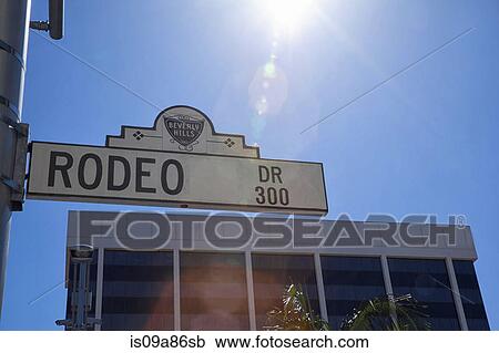 Rodeo Drive sign in sunlight View Large Photo Image Stock Image - Rodeo Drive sign in sunlight. Fotosearch