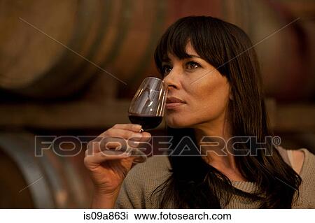 Sampling wine in barrels View Large Photo Image Stock Image - Sampling wine in barrels. Fotosearch