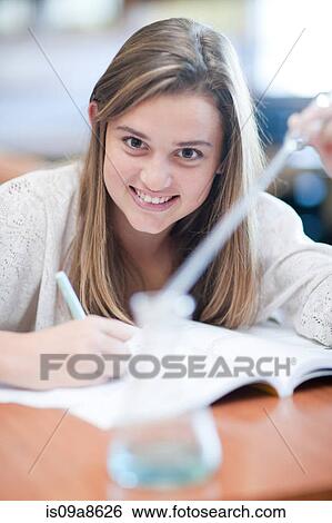 School girl enjoying science lesson View Large Photo Image Stock Photograph - School girl enjoying science lesson. Fotosearch