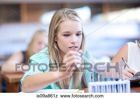 School girls enjoying science lesson View Large Photo Image Stock Photo - School girls enjoying science lesson. Fotosearch