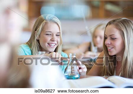 School girls enjoying science lesson View Large Photo Image Stock Photo - School girls enjoying science lesson. Fotosearch