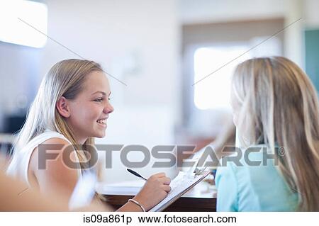 School girls in discussion View Large Photo Image Stock Photography - School girls in discussion. Fotosearch