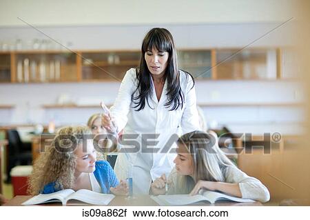 Science teacher in class View Large Photo Image Stock Image - Science teacher in class. Fotosearch