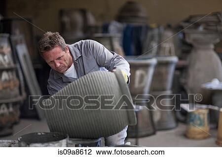 Sculpting and shaping pottery View Large Photo Image Stock Image - Sculpting and shaping pottery. Fotosearch
