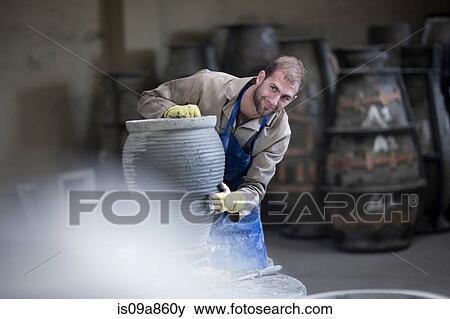 Sculpting and shaping pottery View Large Photo Image Stock Photo - Sculpting and shaping pottery. Fotosearch