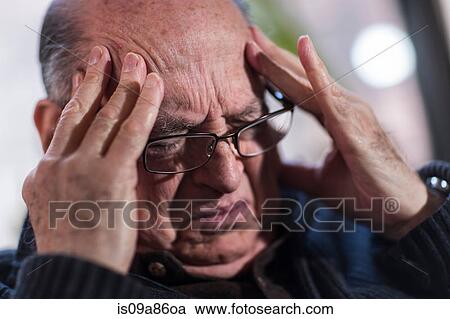 Senior man with eyes closed, wearing glasses, looking stressed View Large Photo Image Stock Image - Senior man with eyes closed, wearing glasses, looking stressed. Fotosearch
