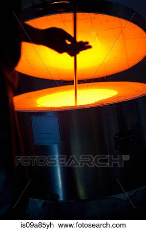 Silhouette of man using furnace in glass factory View Large Photo Image Stock Image - Silhouette of man using furnace in glass factory. Fotosearch