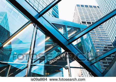 Picture - Skyscrapers through subway entrance, New York City, USA. Fotosearch