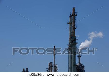 Stock Image - Smoke from refinery chimney, Port of Los Angeles, California, USA. Fotosearch