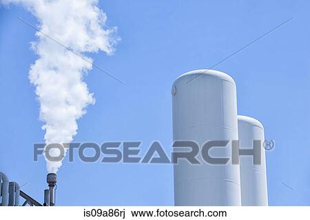 Stock Image - Smoke from refinery chimney, Port of Los Angeles, California, USA. Fotosearch