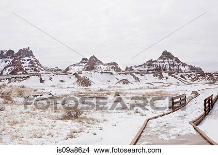 Snow covered mountains in Badlands National Park, South Dakota, USA View Large Photo Image Picture - Snow covered mountains in Badlands National Park, South Dakota, USA. Fotosearch