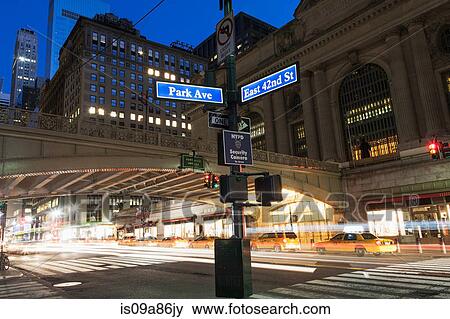 Stock Photo - Street signs outside Grand Central Station, New York City, USA. Fotosearch