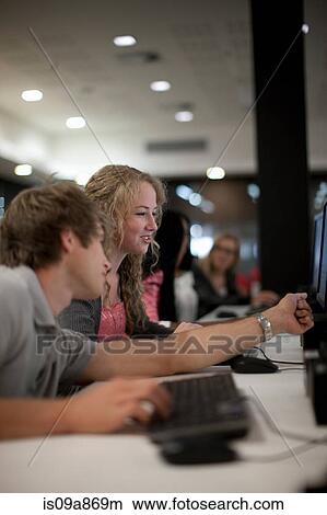 Picture - Students using computers in class. Fotosearch