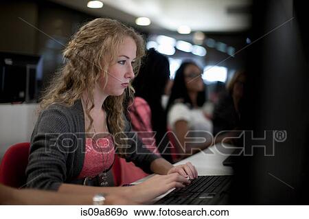 Picture - Students using computers in class. Fotosearch