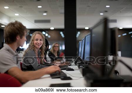 Students using computers in class View Large Photo Image Stock Image - Students using computers in class. Fotosearch