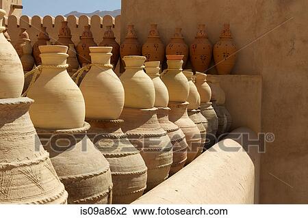 Terracotta pots in Nizwa Castle, Nizwa, Oman View Large Photo Image Stock Image - Terracotta pots in Nizwa Castle, Nizwa, Oman. Fotosearch
