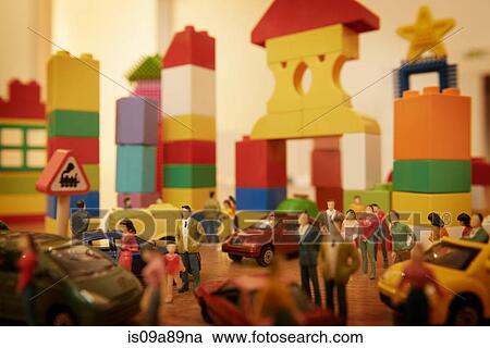 Toy cars and figurines in pretend plastic block town View Large Photo Image Stock Image - Toy cars and figurines in pretend plastic block town. Fotosearch