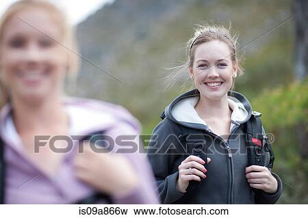 Stock Photo - Two girls hiking. Fotosearch