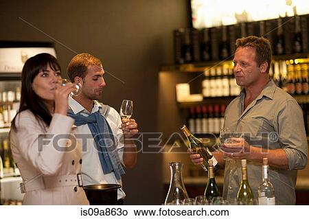 Wine tasting at wine growers shop View Large Photo Image Picture - Wine tasting at wine growers shop. Fotosearch