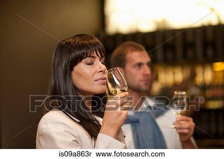 Stock Photography - Wine tasting at wine growers shop. Fotosearch
