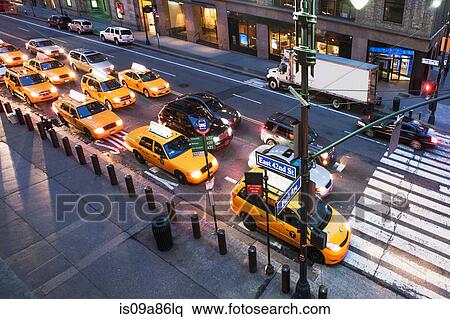 Yellow cabs and cars at pedestrian crossing New York City, USA View Large Photo Image Stock Photography - Yellow cabs and cars at pedestrian crossing New York City, USA. Fotosearch