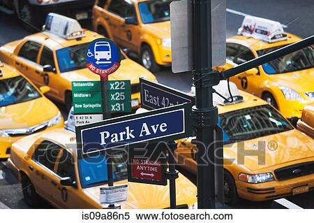 Yellow taxis during rush hour 42nd Street, New York, USA View Large Photo Image Stock Photography - Yellow taxis during rush hour 42nd Street, New York, USA. Fotosearch