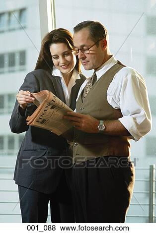 Business people reading View Large Photo Image Stock Photo - Business people reading. Fotosearch