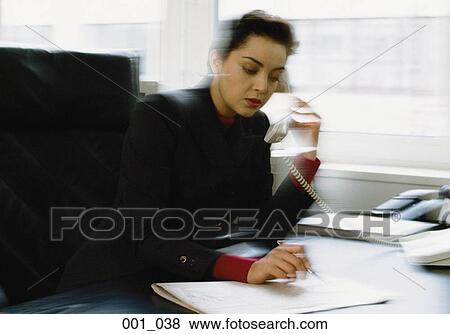 Stock Photo - Business woman on phone. Fotosearch