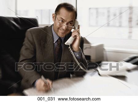 Businessman on phone View Large Photo Image Stock Image - Businessman on phone. Fotosearch