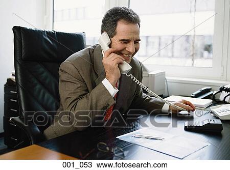 Businessman on phone View Large Photo Image Stock Image - Businessman on phone. Fotosearch