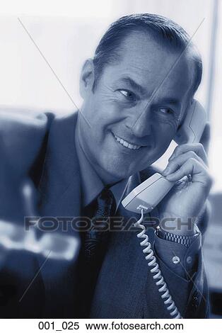Businessman on phone View Large Photo Image Stock Photography - Businessman on phone. Fotosearch