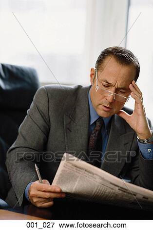 Businessman reading View Large Photo Image Stock Photo - Businessman reading. Fotosearch