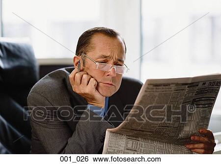 Businessman reading View Large Photo Image Stock Photograph - Businessman reading. Fotosearch