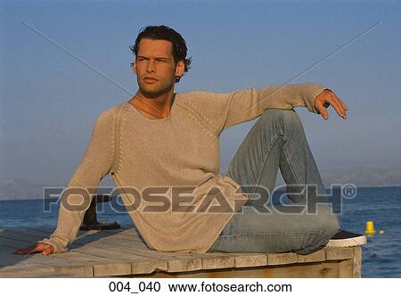 Man by the sea View Large Photo Image Stock Image - Man by the sea. Fotosearch