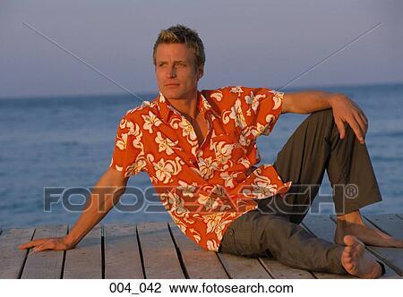 Man by the sea View Large Photo Image Stock Image - Man by the sea. Fotosearch