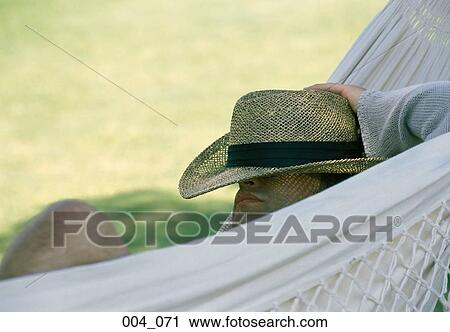 Man in hammock View Large Photo Image Stock Image - Man in hammock. Fotosearch