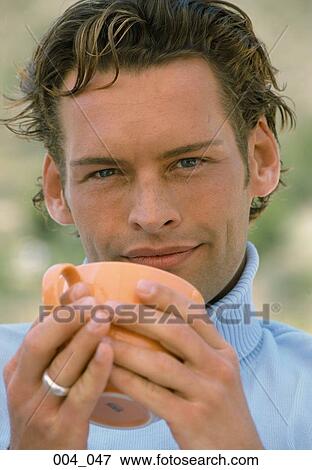Man with cup View Large Photo Image Stock Photo - Man with cup. Fotosearch
