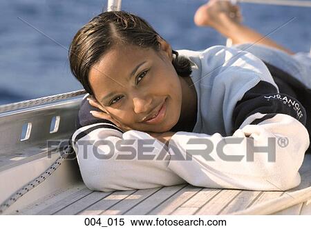 Stock Photography - Woman on boat. Fotosearch