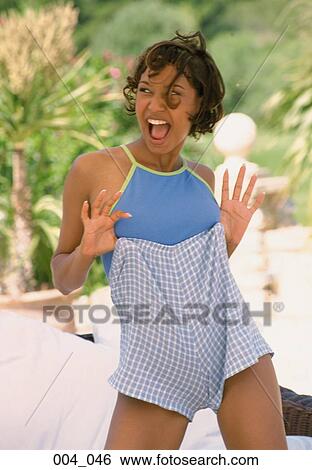 Stock Photograph - Woman wearing shorts. Fotosearch