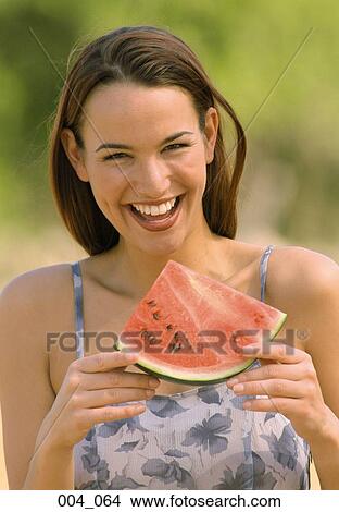 Picture - Woman with melon. Fotosearch