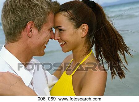 Couple on beach View Large Photo Image Stock Photo - Couple on beach. Fotosearch