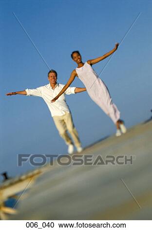 Couple on pier View Large Photo Image Stock Image - Couple on pier. Fotosearch