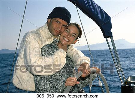 Couple on sailing boat View Large Photo Image Stock Image - Couple on sailing boat. Fotosearch