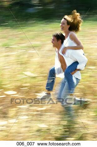 Couple running View Large Photo Image Stock Photo - Couple running. Fotosearch