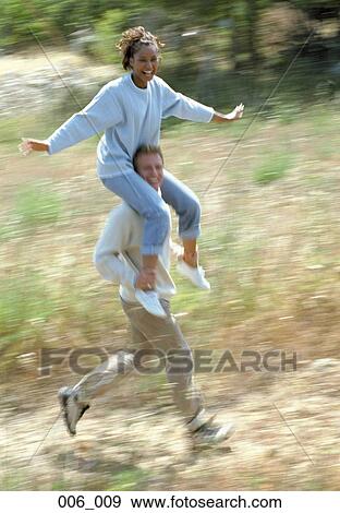 Stock Photo - Couple running. Fotosearch