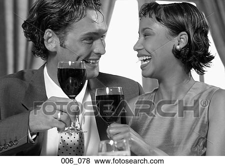 Stock Photo - Couple toasting. Fotosearch