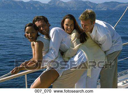 Friends on sailing boat View Large Photo Image Stock Image - Friends on sailing boat. Fotosearch
