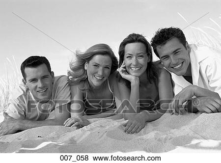 Friends on the beach View Large Photo Image Stock Photo - Friends on the beach. Fotosearch