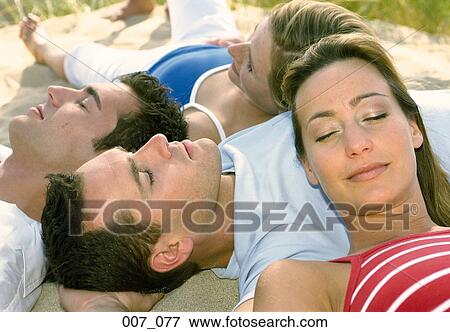 Friends on the beach View Large Photo Image Stock Photo - Friends on the beach. Fotosearch