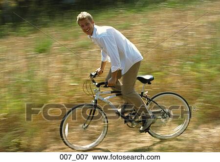 Stock Photo - Man cycling. Fotosearch